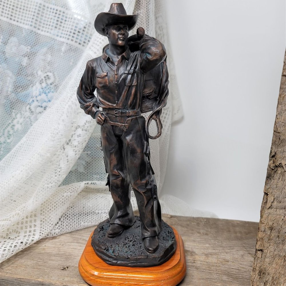 Vanmark Cowboy with Saddle Branded iron Collection Figurine